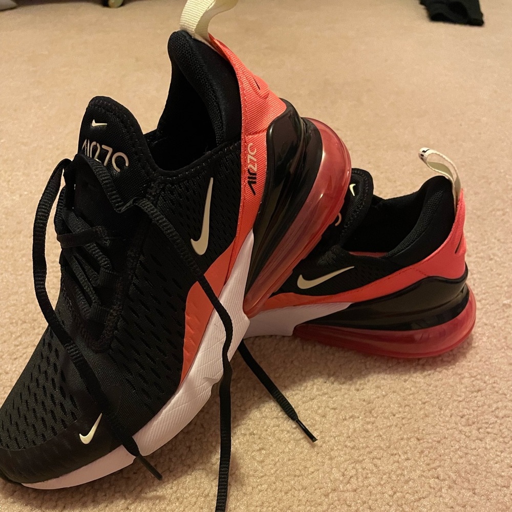 Pink and black Nike air maxes